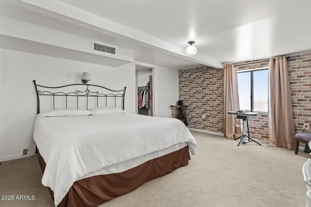 a bathroom with a sink a vanity and a mirror