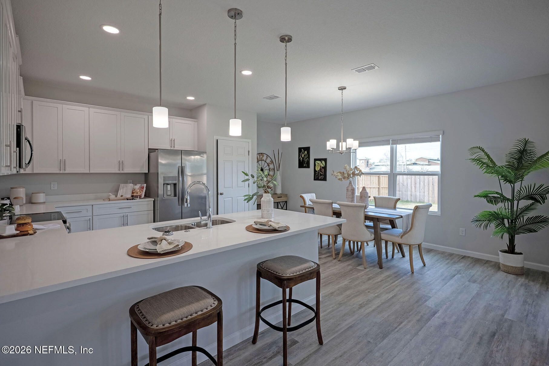 1218 Jewelstone Lane Jacksonville, FL 32221 - Photo 11 of 53 a kitchen with a table and chairs in it