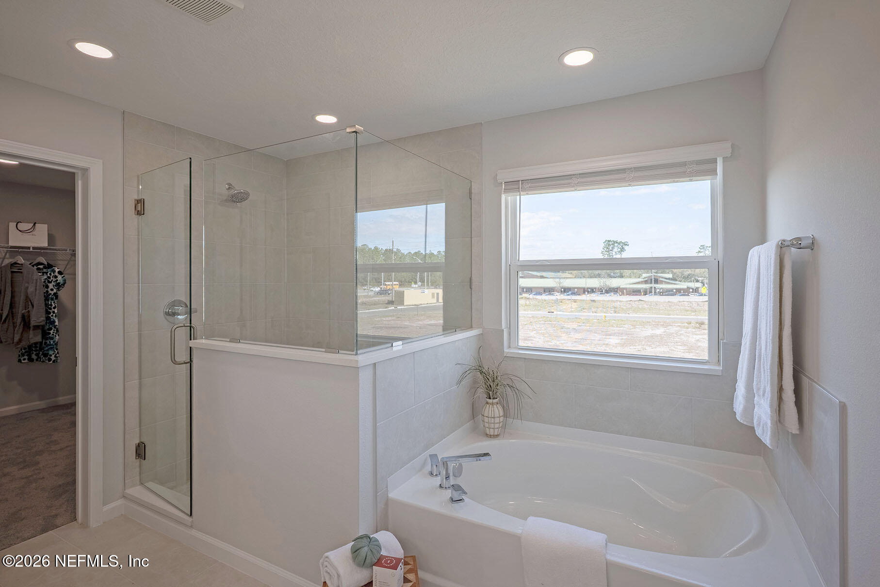 1218 Jewelstone Lane Jacksonville, FL 32221 - Photo 23 of 53 a white bath tub sitting next to a window