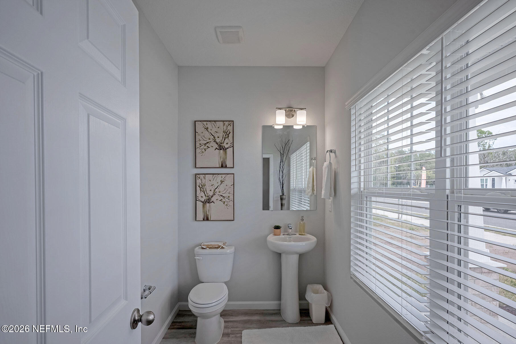 1218 Jewelstone Lane Jacksonville, FL 32221 - Photo 27 of 53 a bathroom with a toilet sink and shower