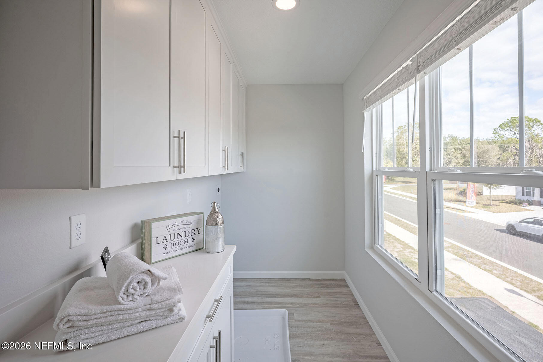 1218 Jewelstone Lane Jacksonville, FL 32221 - Photo 30 of 53 a view of a livingroom with an empty space and a window