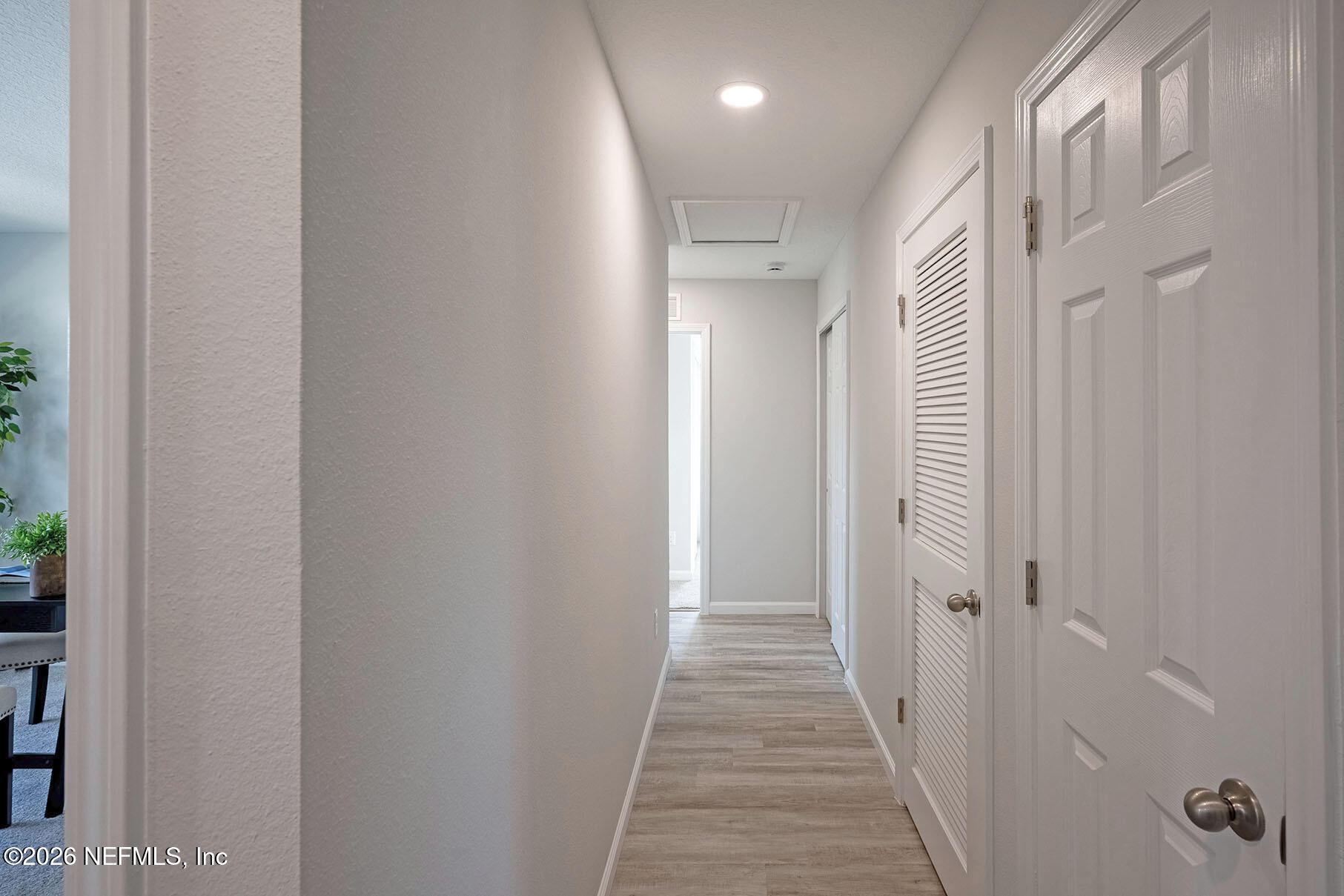 1218 Jewelstone Lane Jacksonville, FL 32221 - Photo 43 of 53 a view of a hallway with wooden floor and staircase