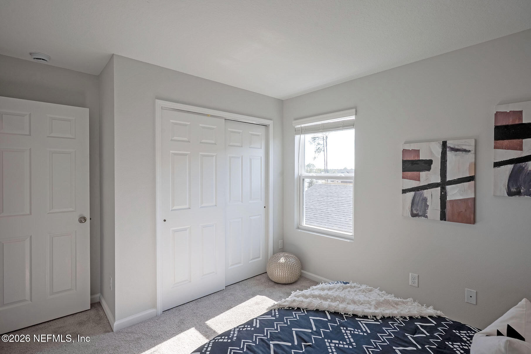 1218 Jewelstone Lane Jacksonville, FL 32221 - Photo 45 of 53 a bedroom with bed and window