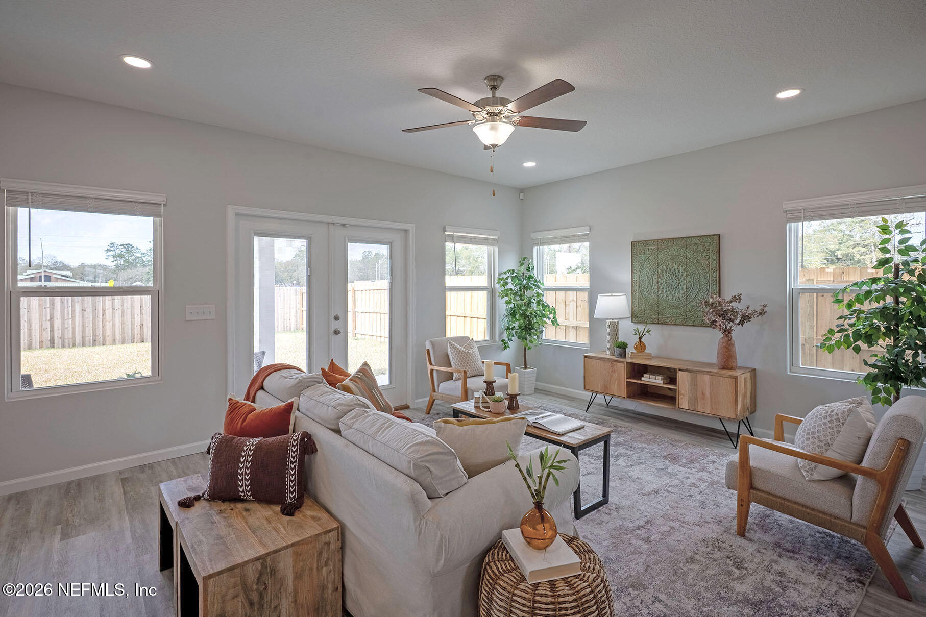 1218 Jewelstone Lane Jacksonville, FL 32221 - Photo 5 of 53 a living room with furniture and a large window