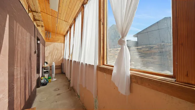 a view of a door and chair