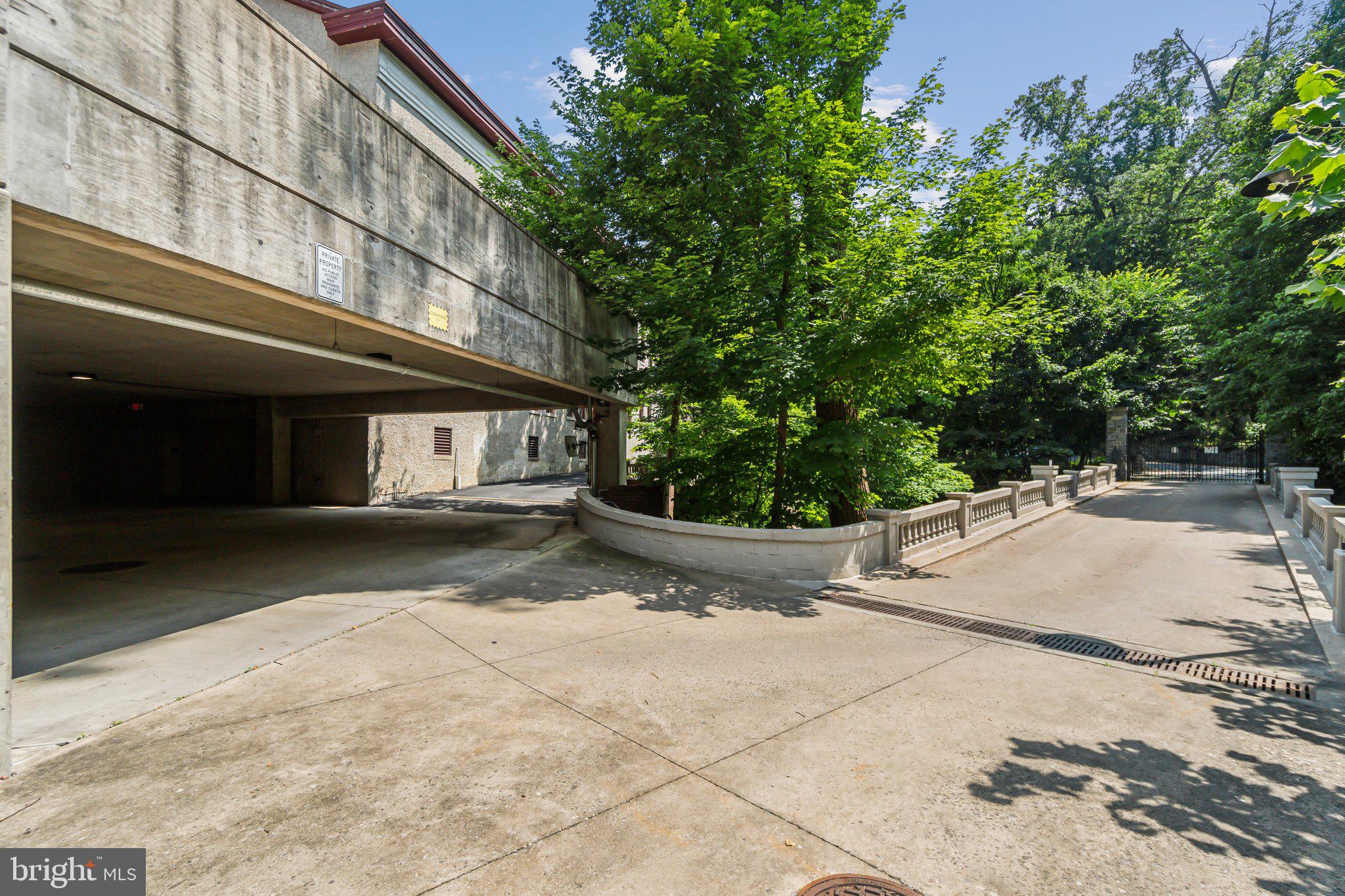 9610 Dewitt Drive, Unit B414 Silver Spring, MD 20910 - Photo 21 of 31 Entrance and exit from garage gated parking