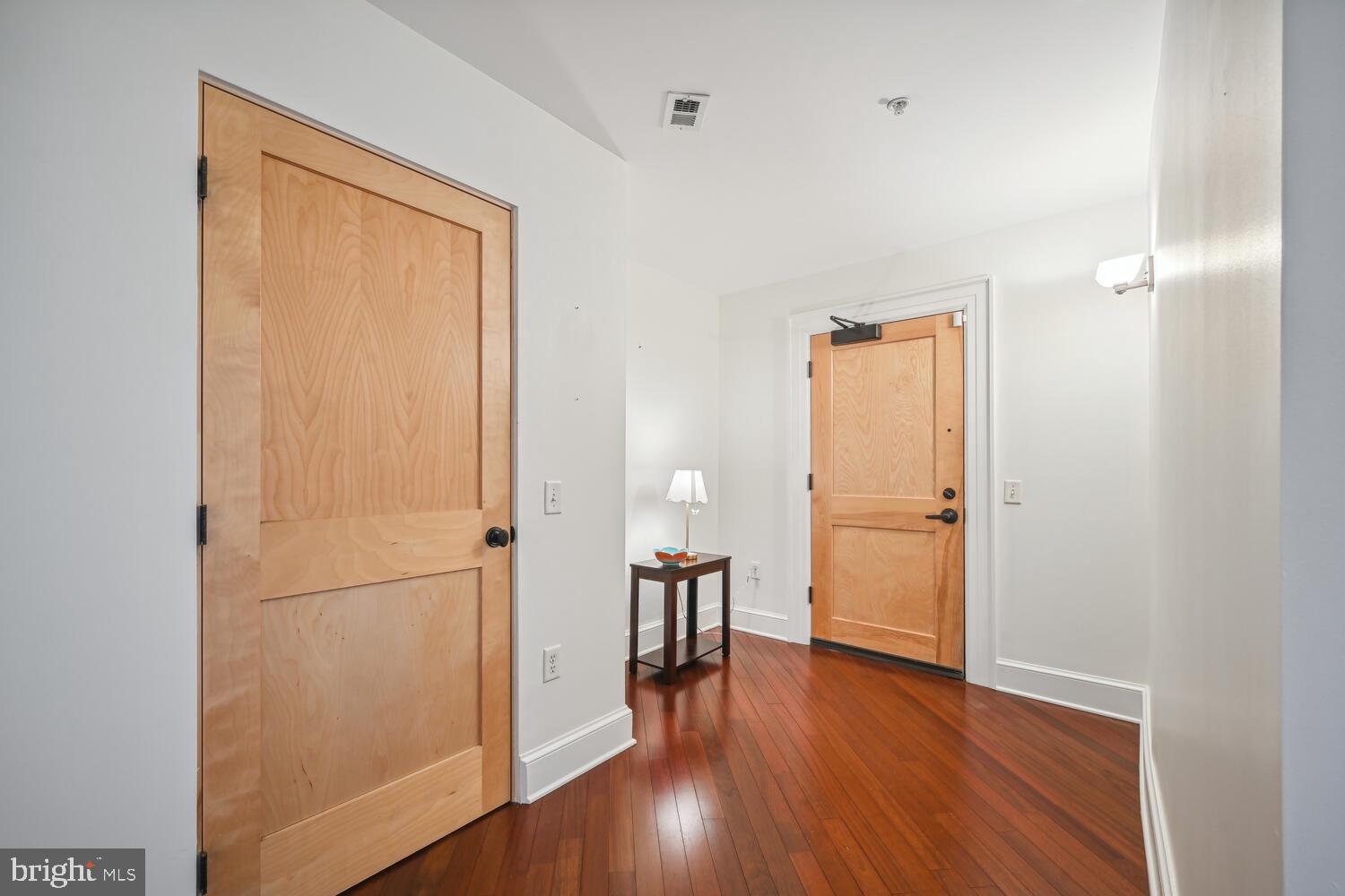 9610 Dewitt Drive, Unit B414 Silver Spring, MD 20910 - Photo 4 of 31 Spacious foyer with coat closet, space for table
