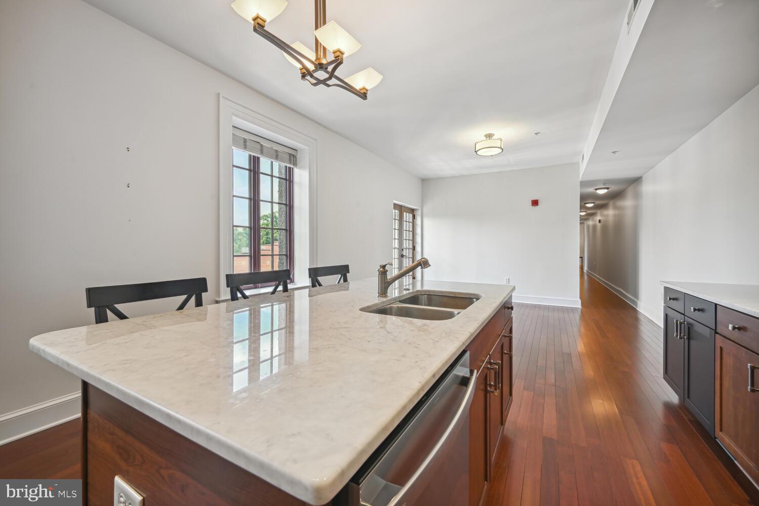 9610 Dewitt Drive, Unit B414 Silver Spring, MD 20910 - Photo 6 of 31 New white marble island & countertops