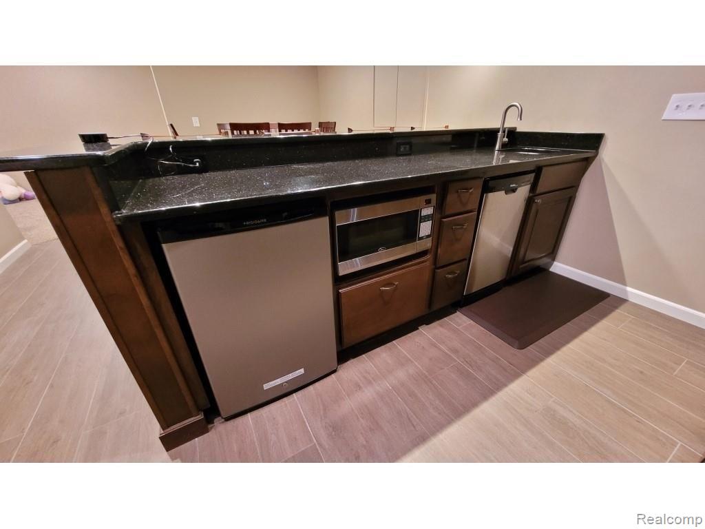 2036 Roundtree Rochester, MI 48307 - Photo 27 of 32 27-Basement Bar Appliances.jpg