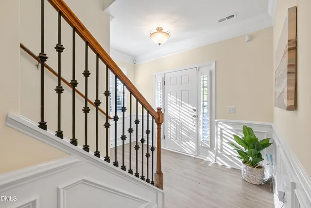 a view of a room with a ceiling fan