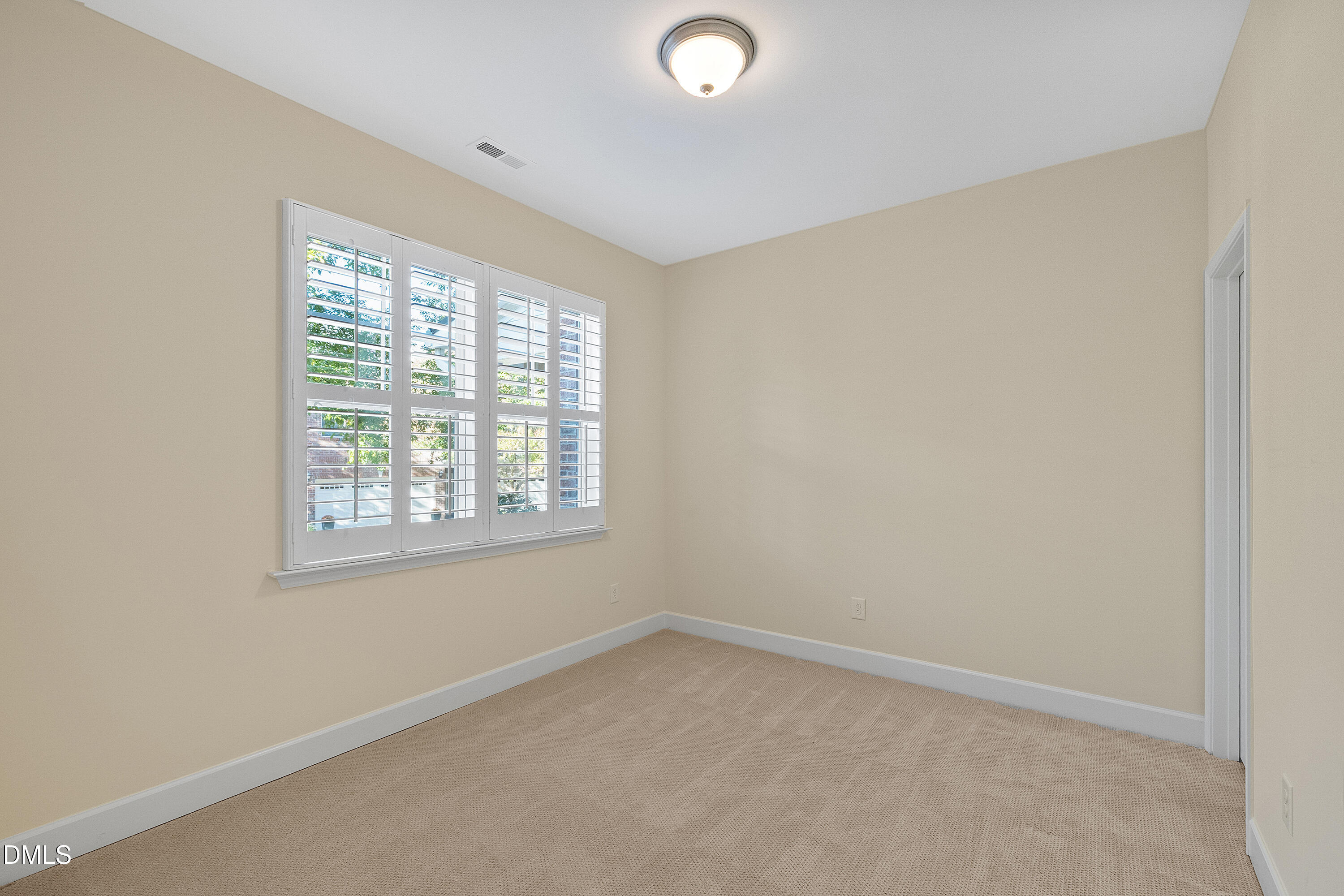 2063 Weston Green Loop Cary, NC 27513 - Photo 11 of 40 an empty room with a window