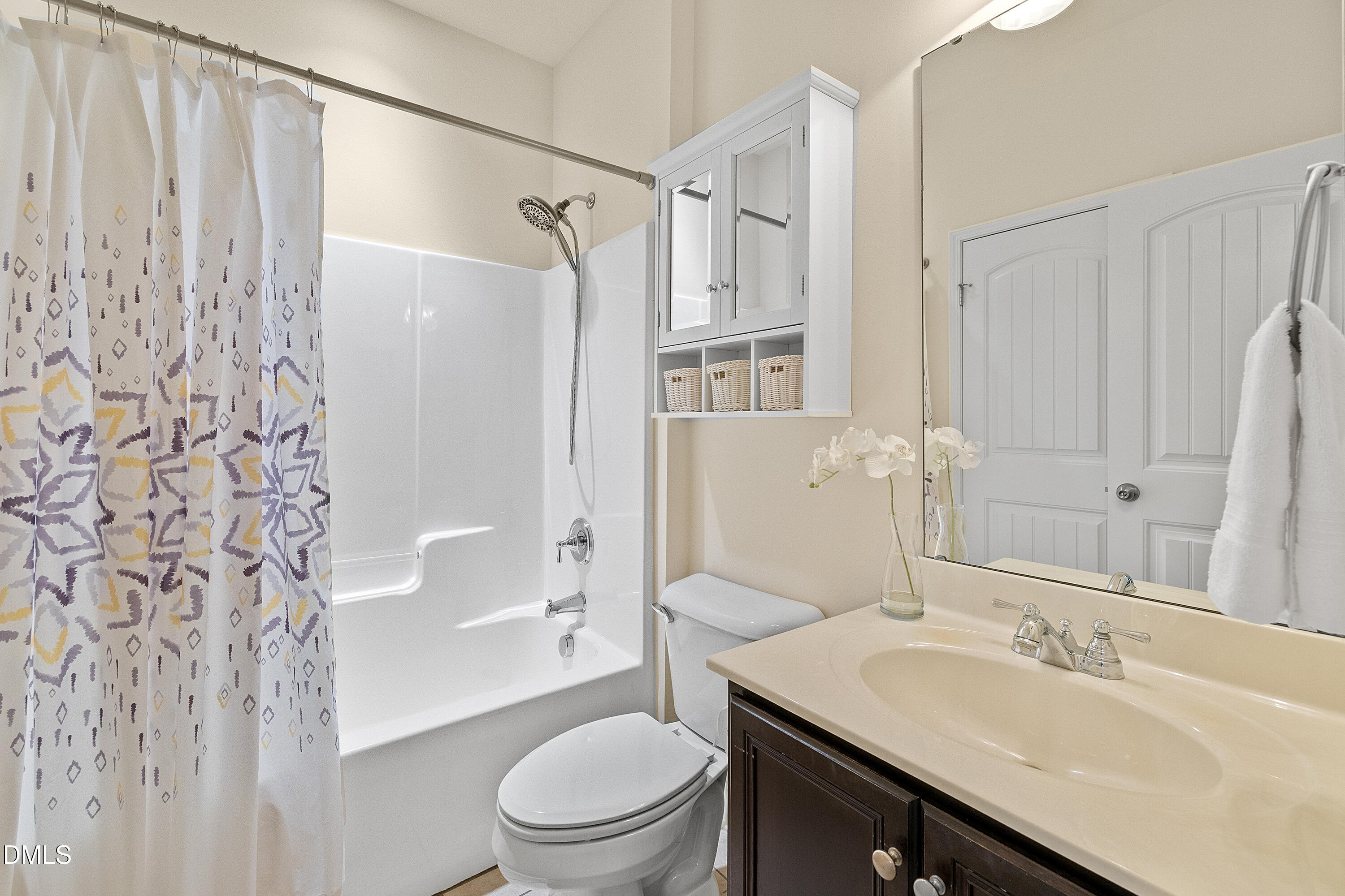 2063 Weston Green Loop Cary, NC 27513 - Photo 13 of 40 a bathroom with a sink toilet tub and shower