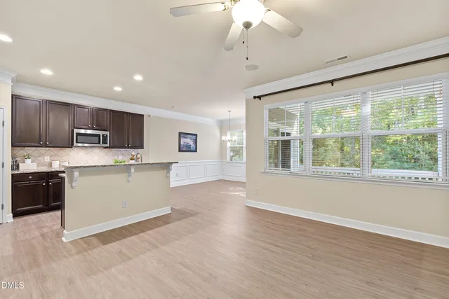 a bathroom with a sink toilet tub and shower