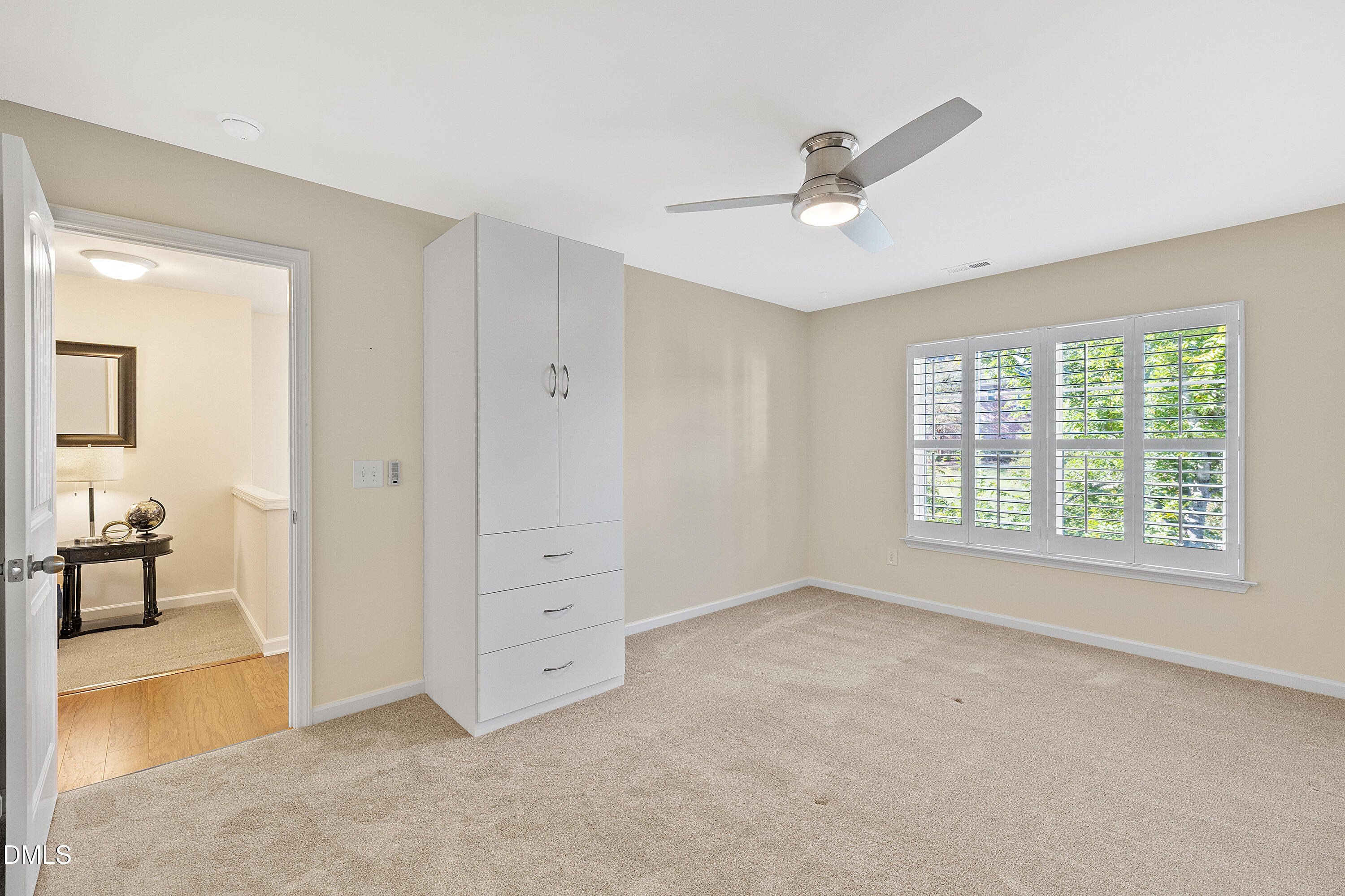2063 Weston Green Loop Cary, NC 27513 - Photo 24 of 40 a view of an empty room with a window