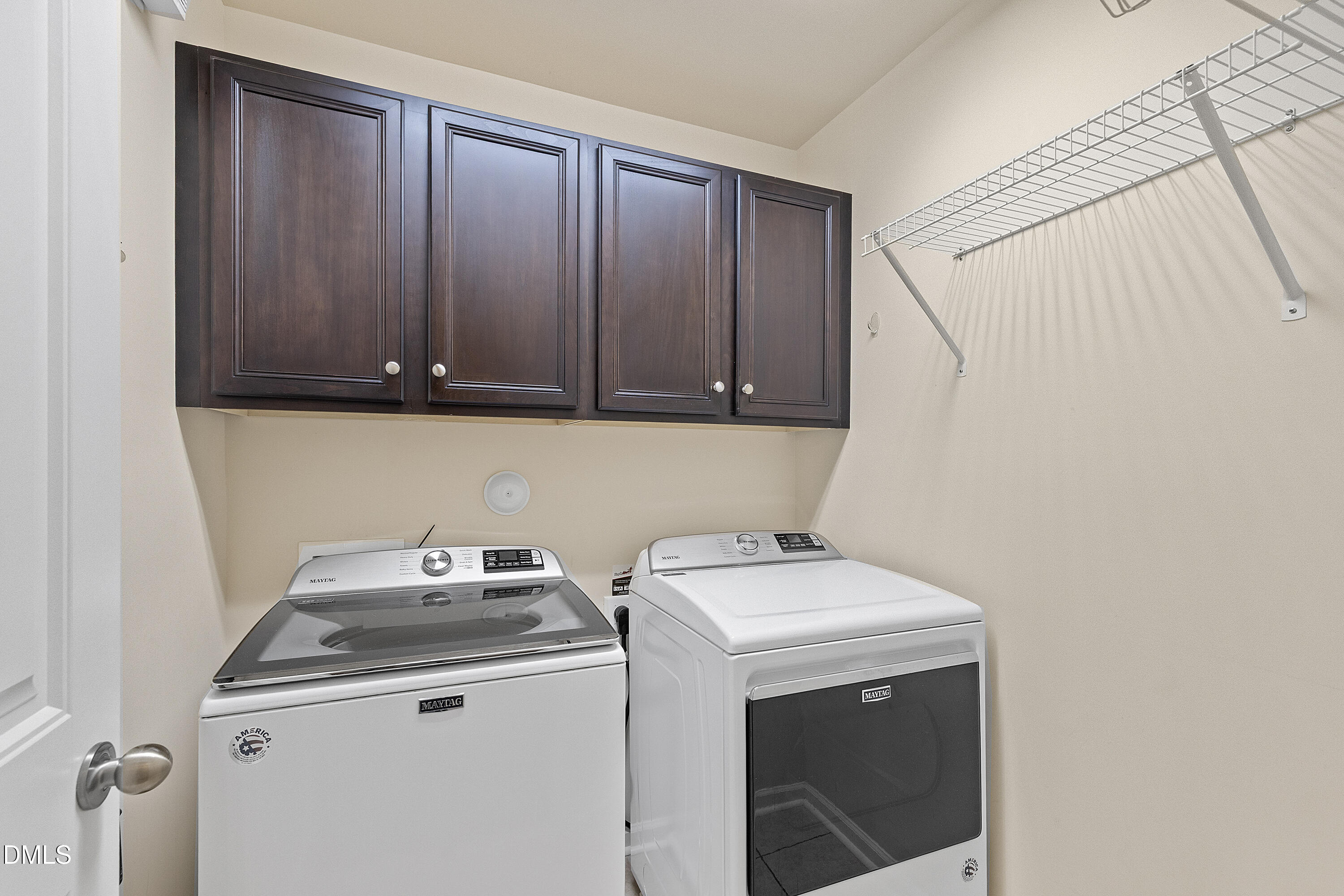 2063 Weston Green Loop Cary, NC 27513 - Photo 27 of 40 a utility room with dryer and washer