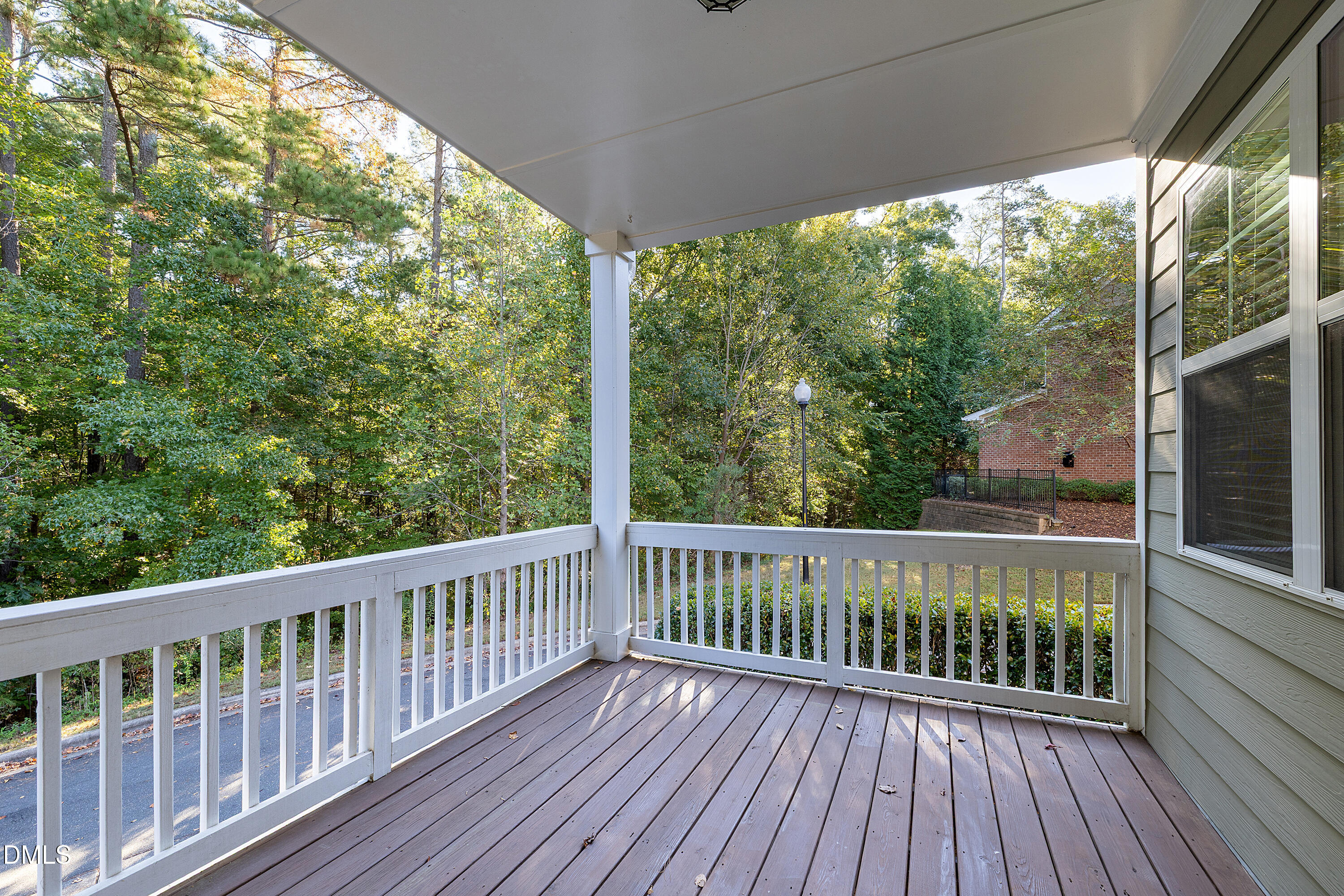 2063 Weston Green Loop Cary, NC 27513 - Photo 5 of 40 a view of a wooden deck with a yard