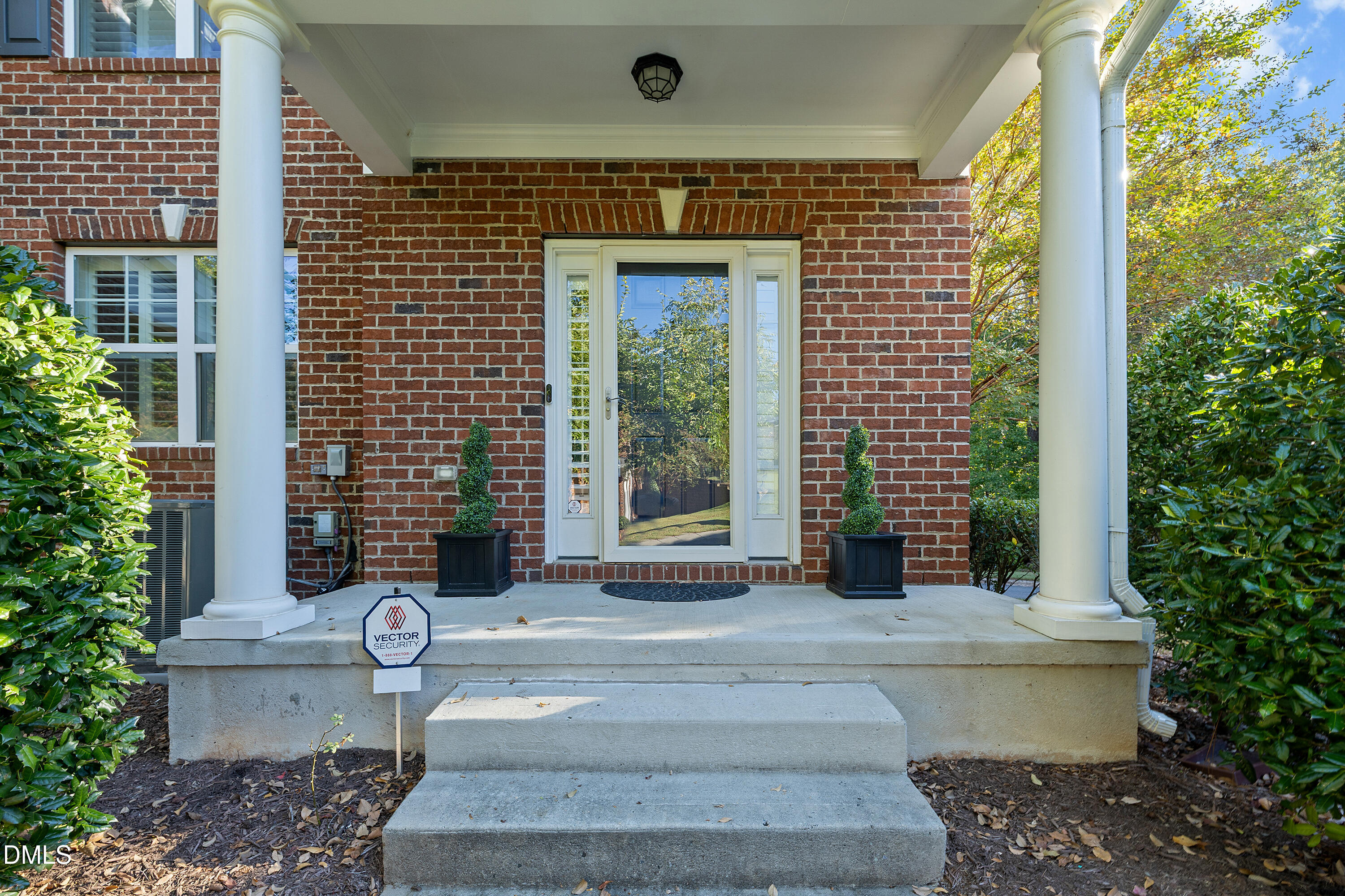 2063 Weston Green Loop Cary, NC 27513 - Photo 7 of 40 a front view of a house with garden