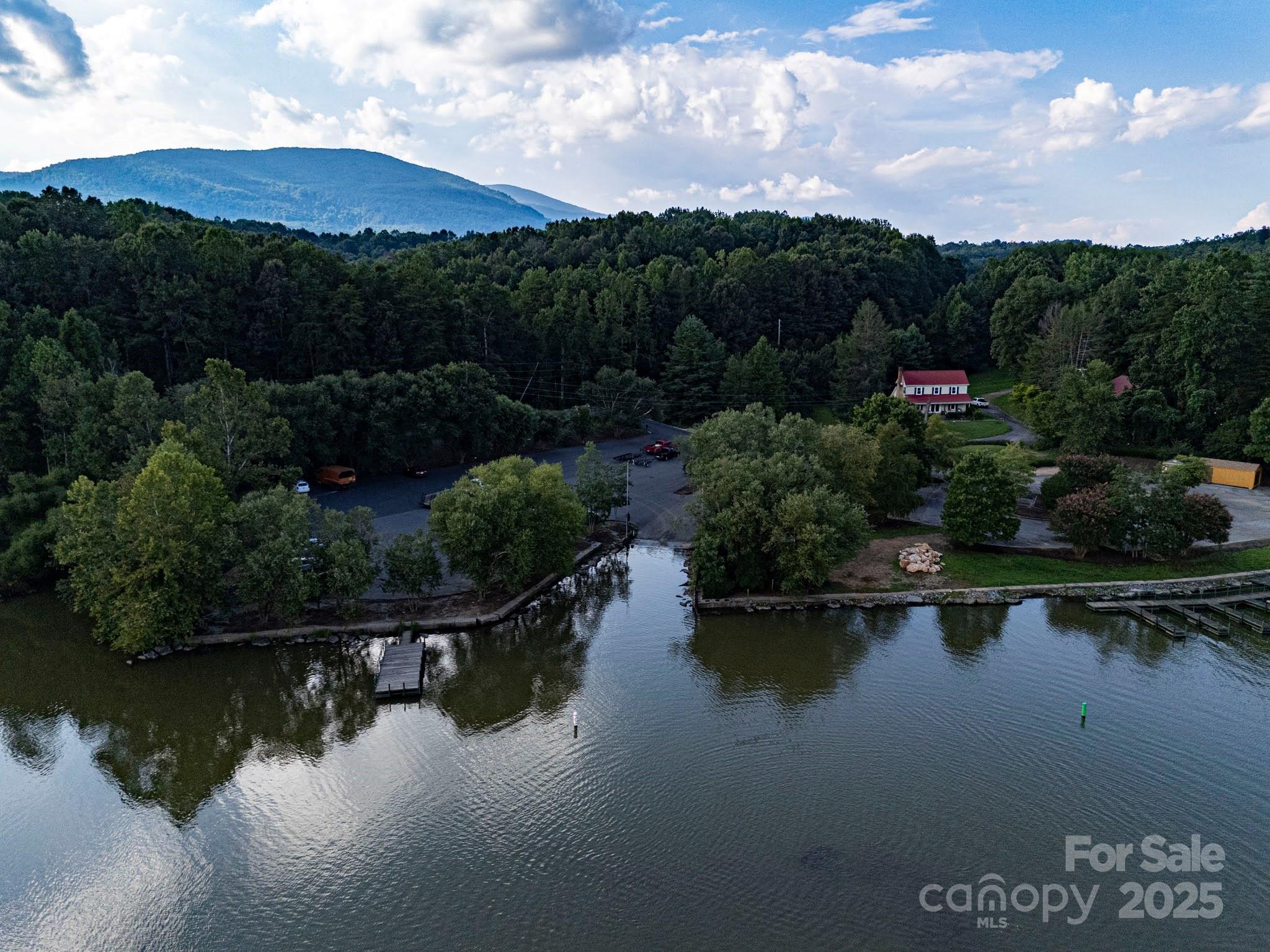 Tbd Tbd Parkway Rd Mill Spring North, Unit 3 Mill Spring, NC 28756 - Photo 28 of 29 a view of a lake in middle of forest