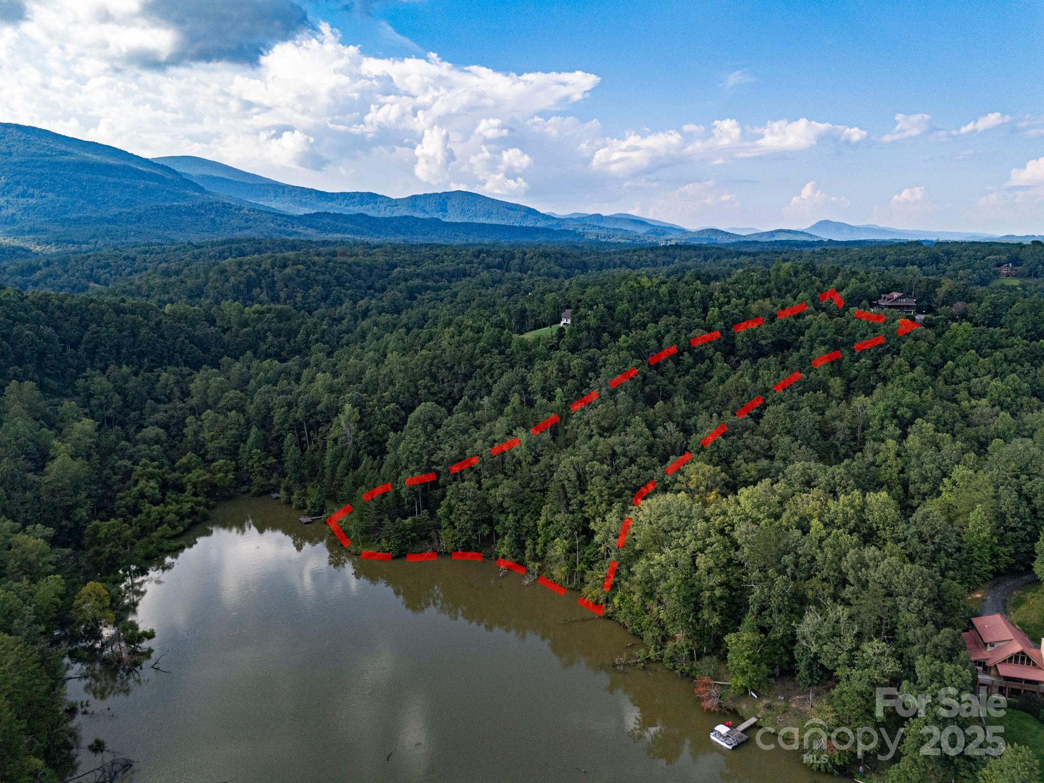 Tbd Tbd Parkway Rd Mill Spring North, Unit 3 Mill Spring, NC 28756 - Photo 7 of 29 a view of a pathway with a flower garden in front of it