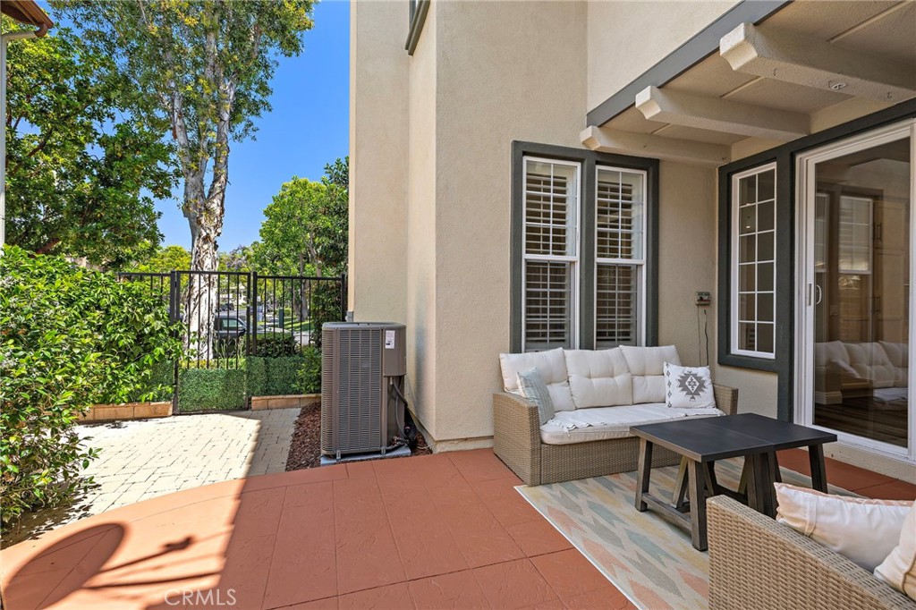 71 Sklar Street Ladera Ranch, CA 92694 - Photo 3 of 55 a view of a patio with couches table and chairs and potted plants