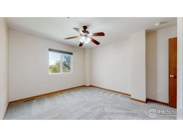 a view of a chairs and table in backyard