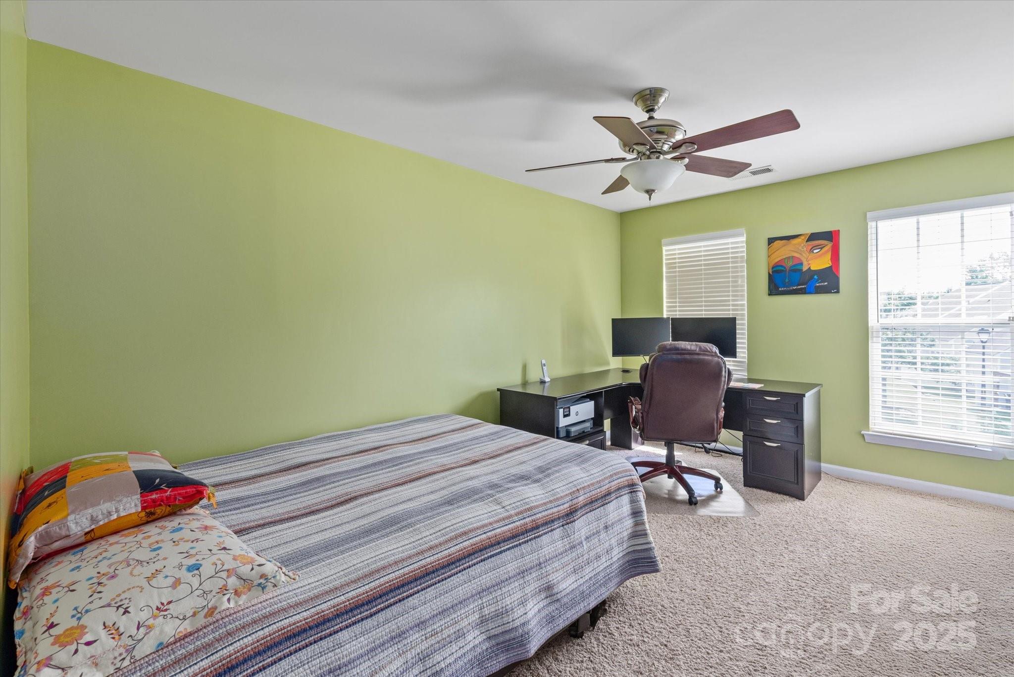 1498 Burrell Avenue Northwest Concord, NC 28027 - Photo 23 of 35 a bedroom with a bed and a window