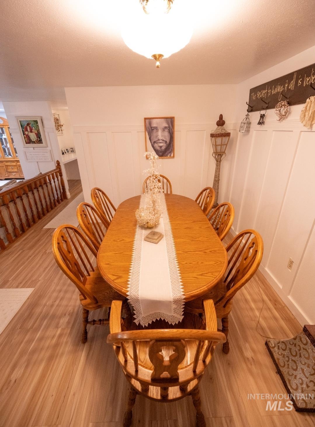650 West 800 S Road Burley, ID 83318 - Photo 6 of 31 Dining area with a decorative wall and wood finished floors