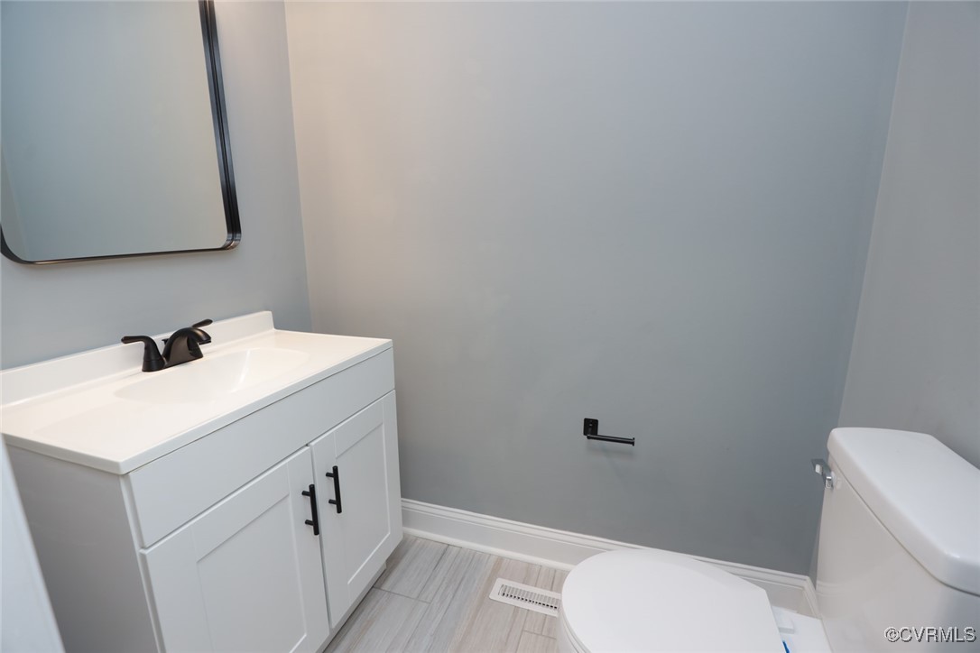 1130 Berryhill Road Henrico, VA 23231 - Photo 12 of 50 Bathroom with toilet and vanity