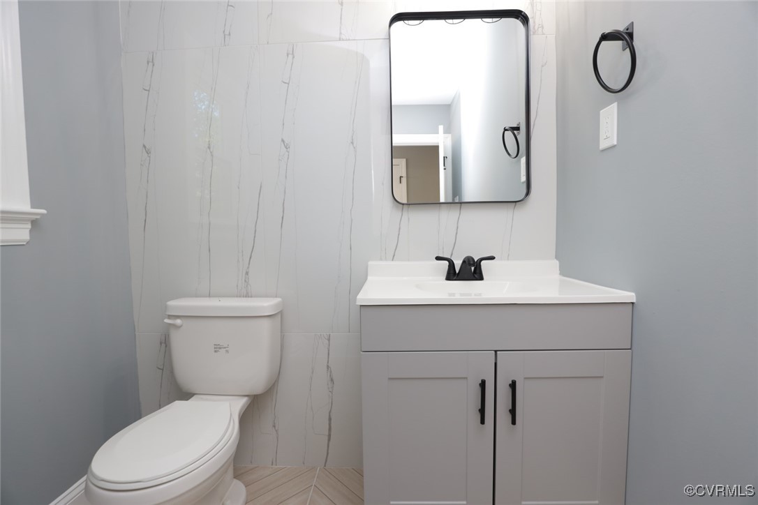 1130 Berryhill Road Henrico, VA 23231 - Photo 19 of 50 Bathroom with vanity and toilet