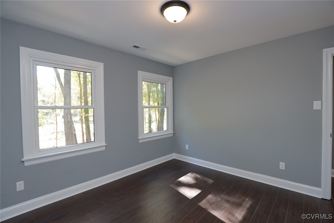 1130 Berryhill Road Henrico, VA 23231 - Photo 21 of 50 Unfurnished room with dark hardwood / wood-style f