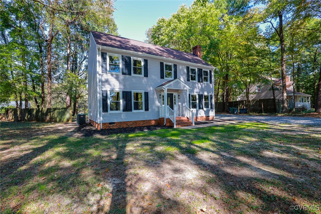 1130 Berryhill Road Henrico, VA 23231 - Photo 30 of 50 Colonial house with a front yard and cooling unit