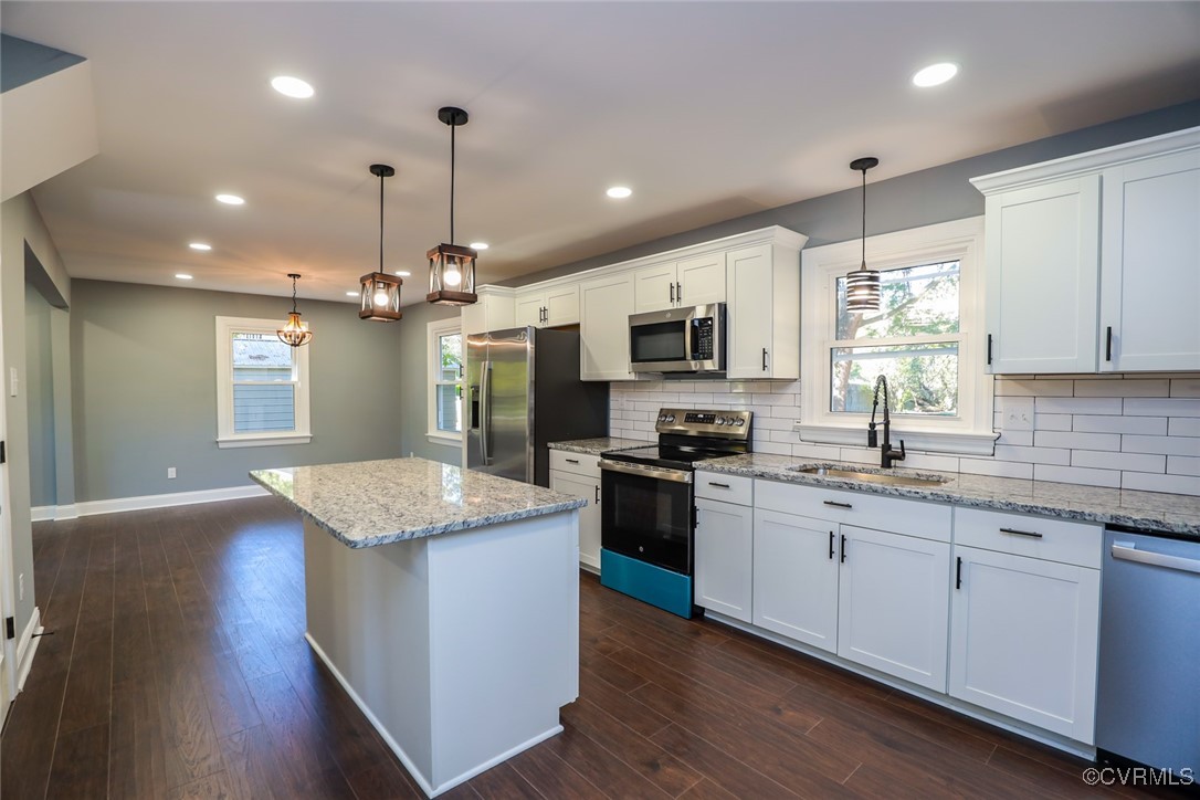 1130 Berryhill Road Henrico, VA 23231 - Photo 41 of 50 Kitchen featuring white cabinetry, stainless steel