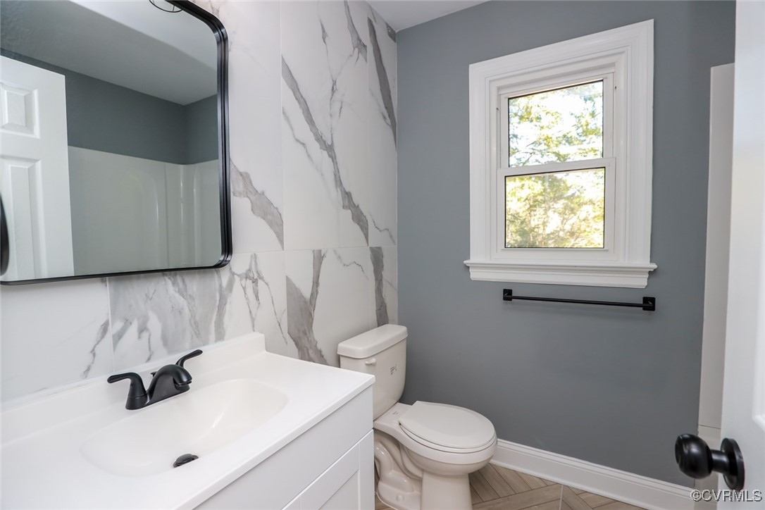 1130 Berryhill Road Henrico, VA 23231 - Photo 5 of 50 Bathroom with vanity, toilet, a shower, and backsp