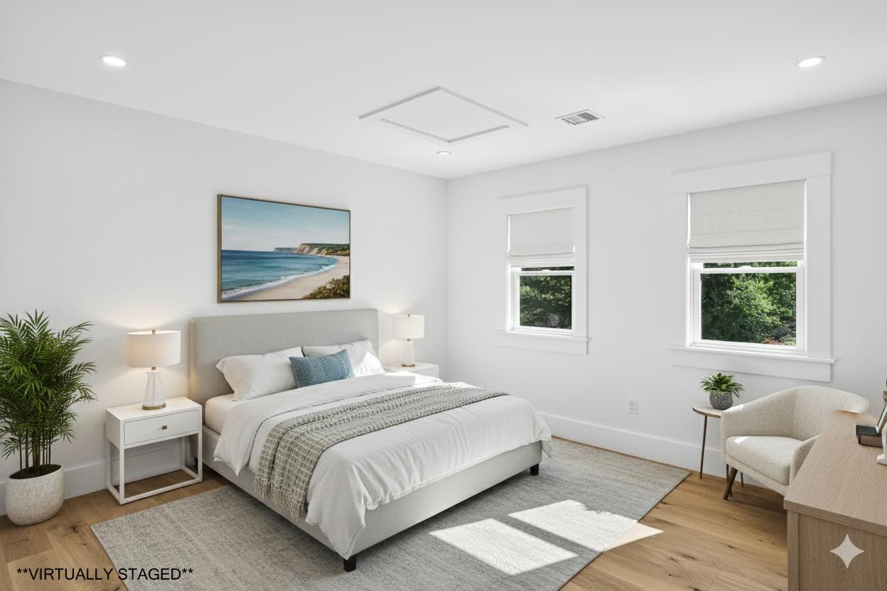 79 Rivers Edge Road East Falmouth, MA 02536 - Photo 51 of 104 a bedroom with a large bed and a window