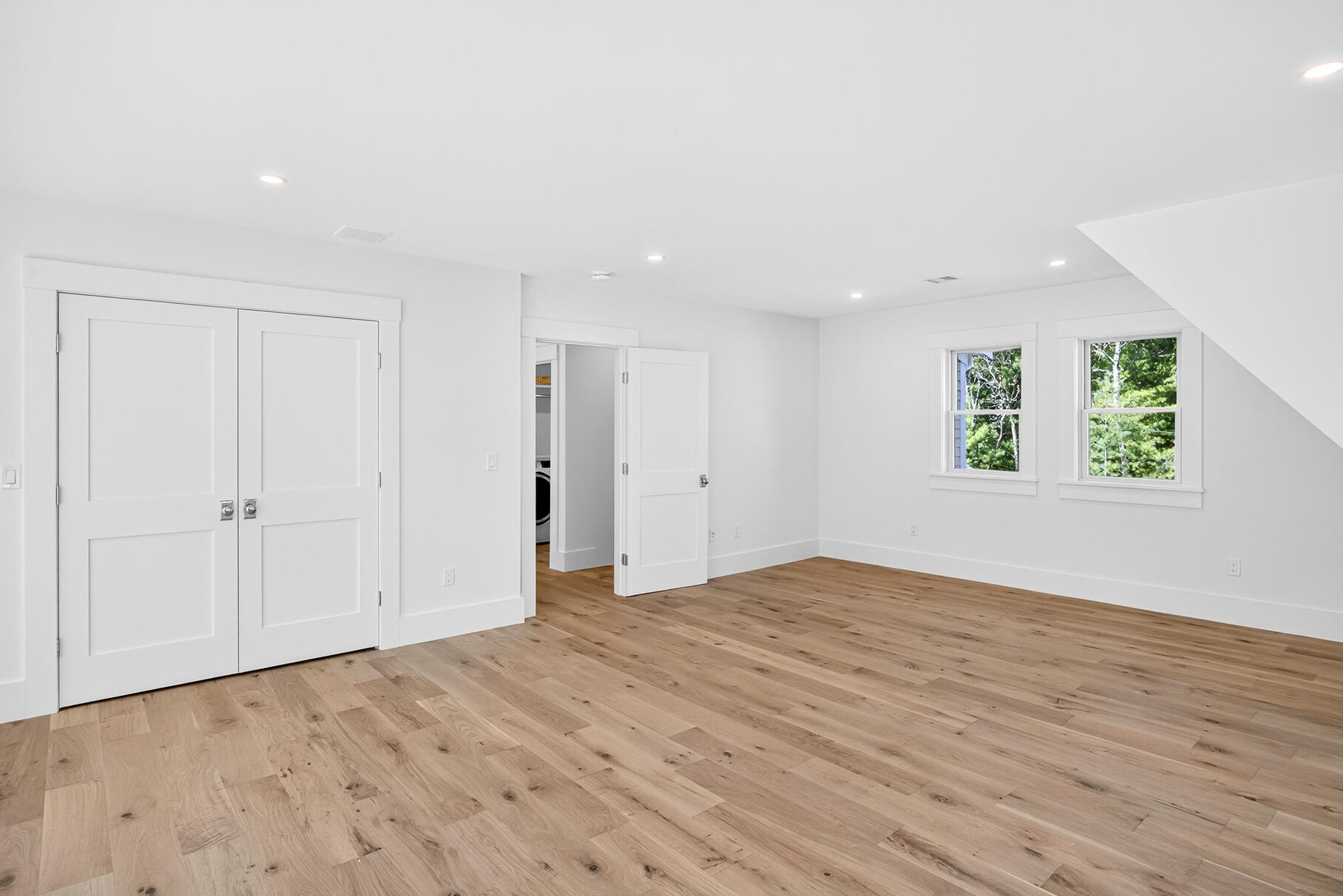 79 Rivers Edge Road East Falmouth, MA 02536 - Photo 63 of 104 a view of an empty room with wooden floor and window