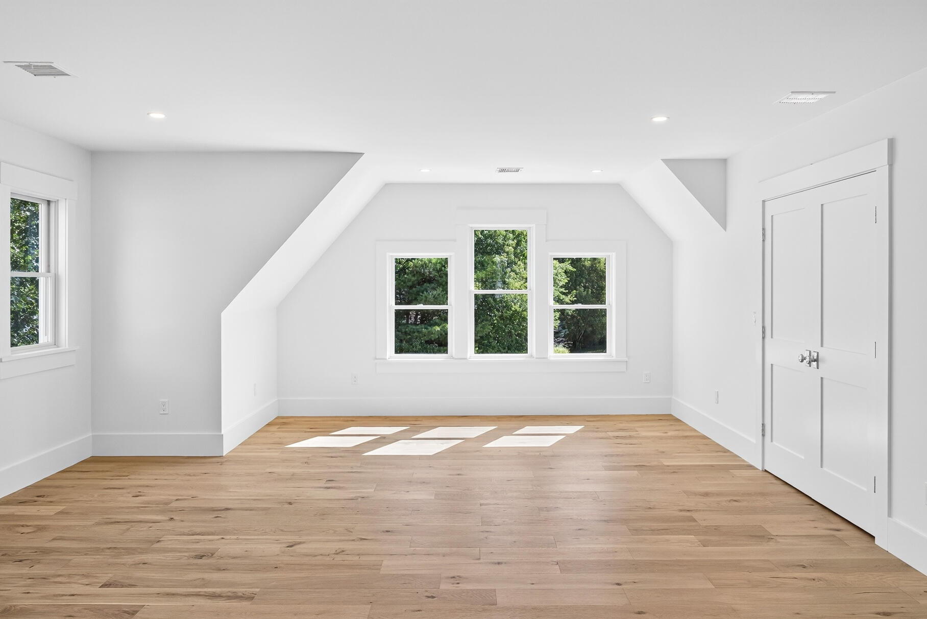 79 Rivers Edge Road East Falmouth, MA 02536 - Photo 64 of 104 a view of an empty room with wooden floor and a window