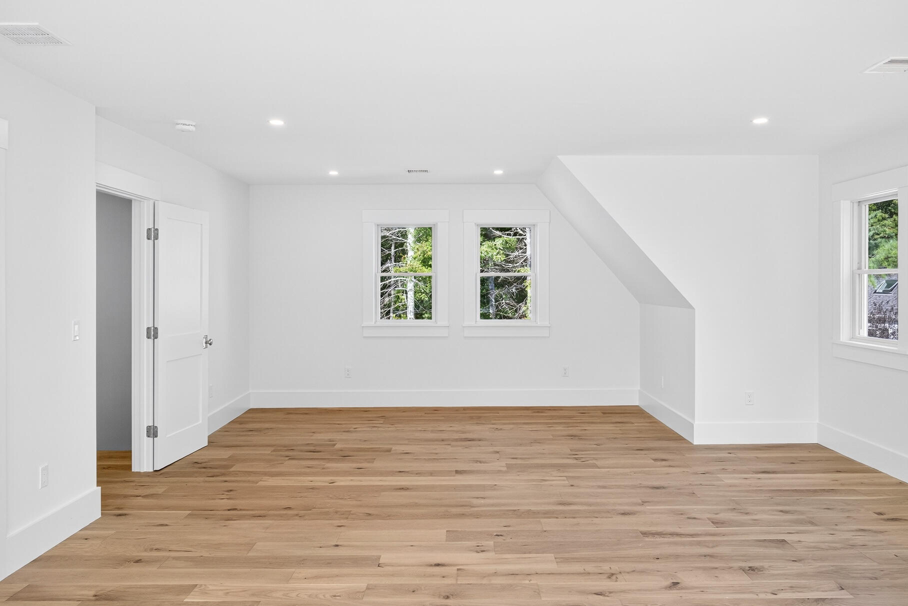 79 Rivers Edge Road East Falmouth, MA 02536 - Photo 65 of 104 an empty room with wooden floor and windows
