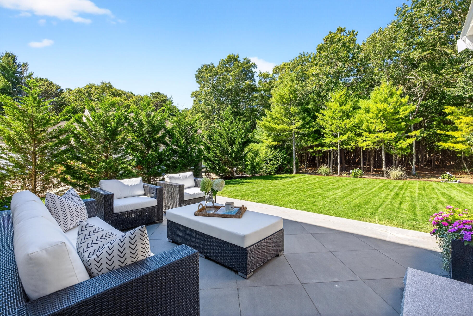 79 Rivers Edge Road East Falmouth, MA 02536 - Photo 71 of 104 a view of a couches in a patio with a yard