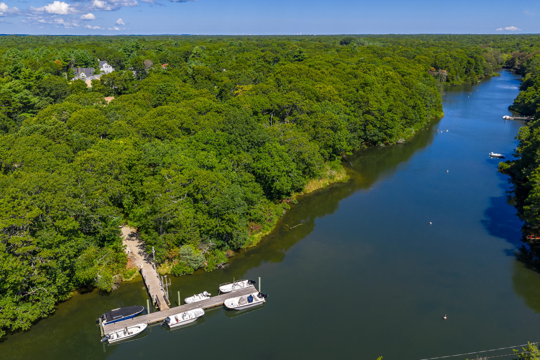 79 Rivers Edge Road East Falmouth, MA 02536 - Photo 78 of 104 a view of a lake with a mountain