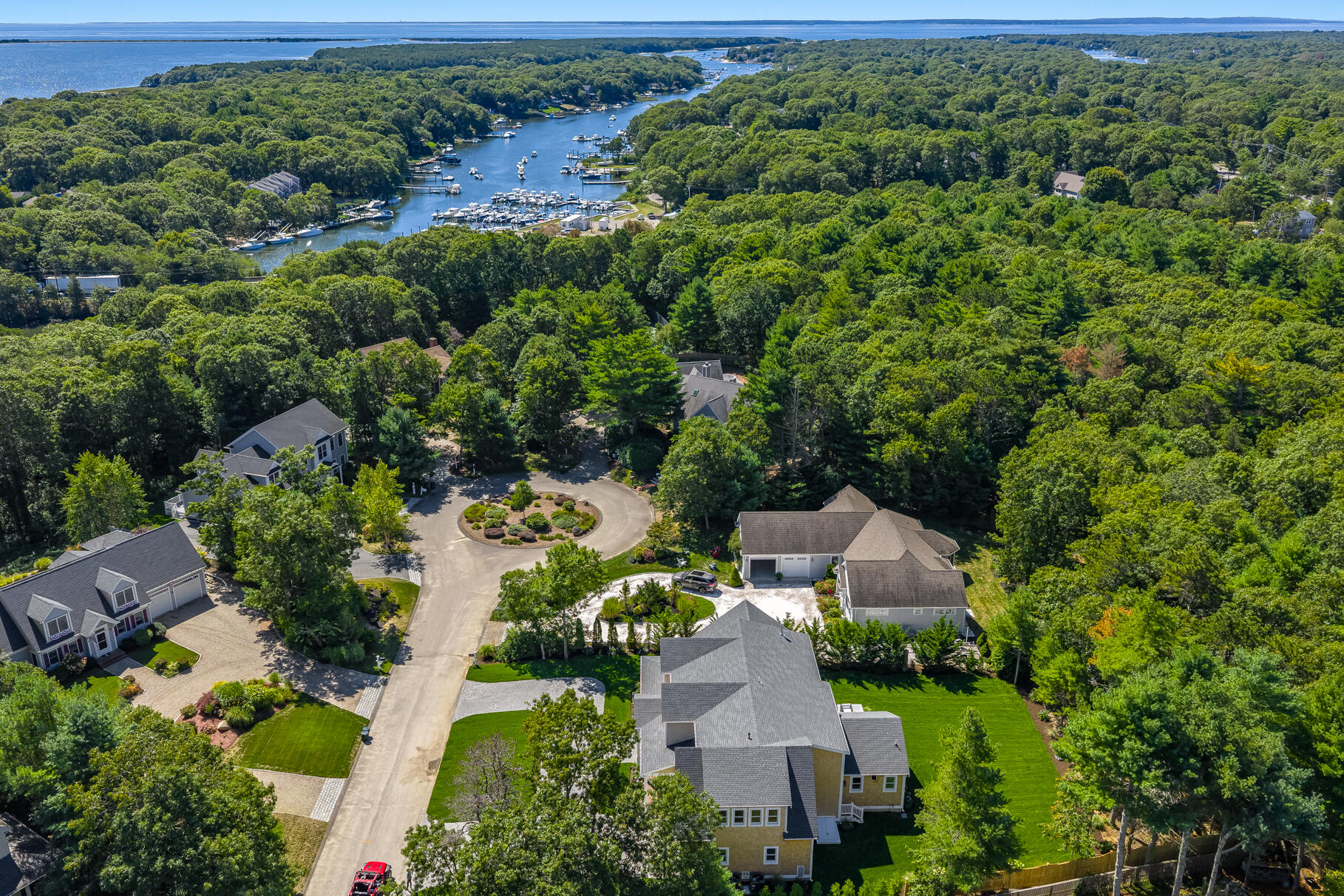79 Rivers Edge Road East Falmouth, MA 02536 - Photo 81 of 104 an aerial view of a house with a yard