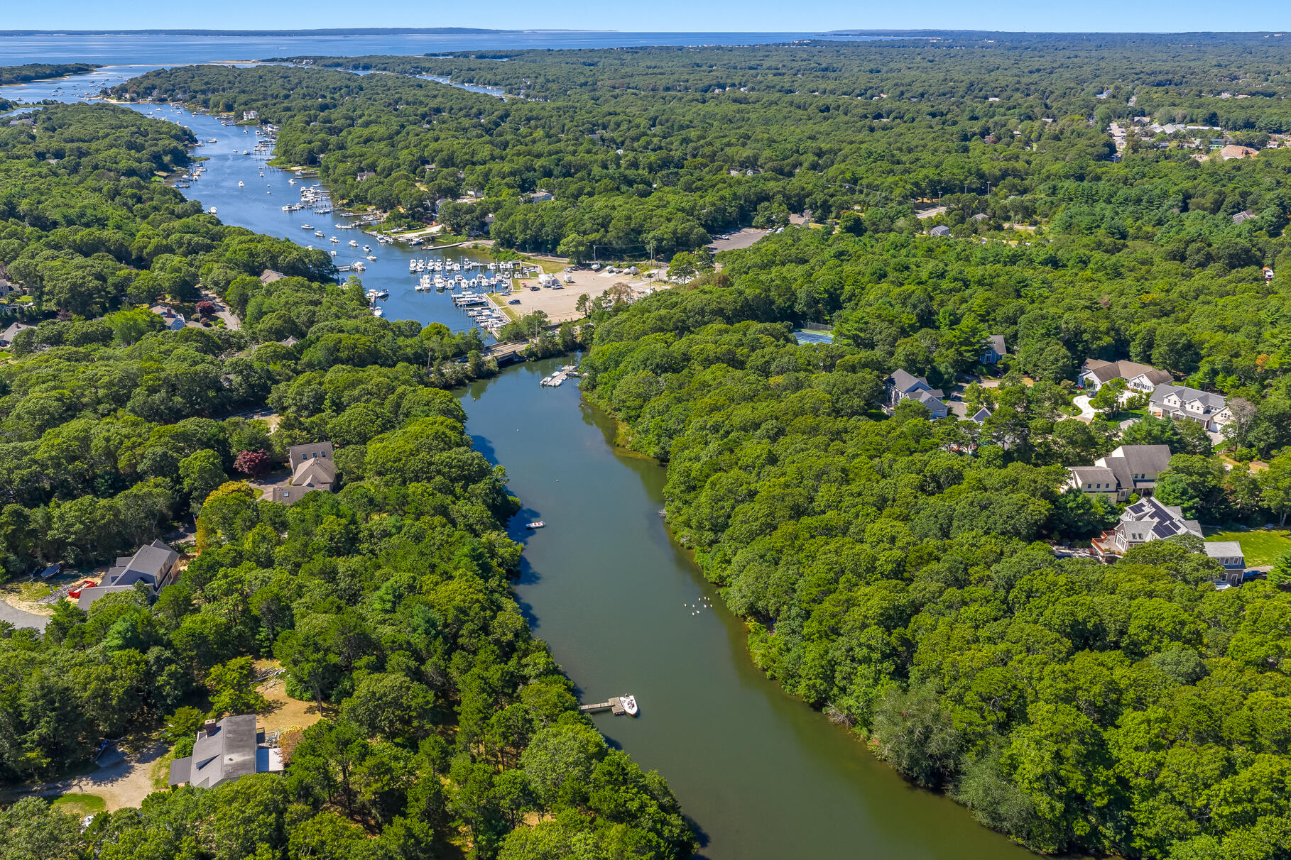 79 Rivers Edge Road East Falmouth, MA 02536 - Photo 86 of 104 an aerial view of a houses with a yard