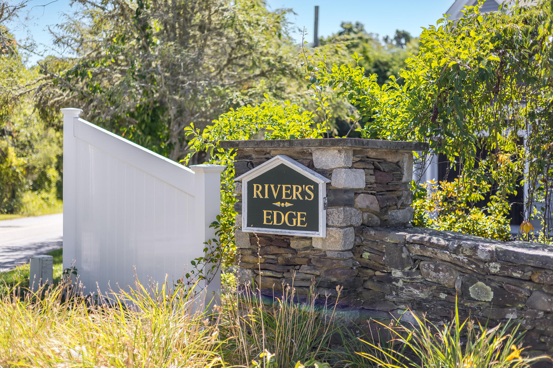 79 Rivers Edge Road East Falmouth, MA 02536 - Photo 87 of 104 a sign that is on a brick wall