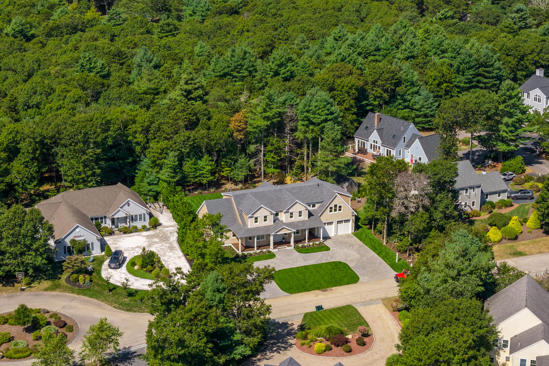 79 Rivers Edge Road East Falmouth, MA 02536 - Photo 91 of 104 an aerial view of a house with garden space and trees all around