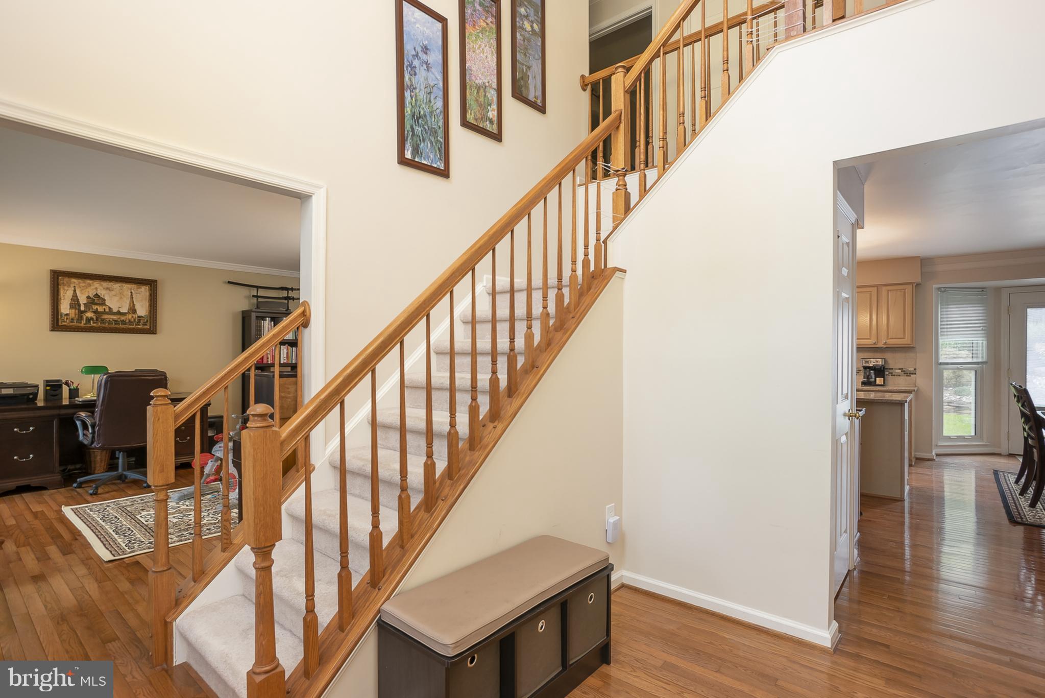 9550 Ridgeview Drive Columbia, MD 21046 - Photo 2 of 30 a view of entryway and hall with wooden floor