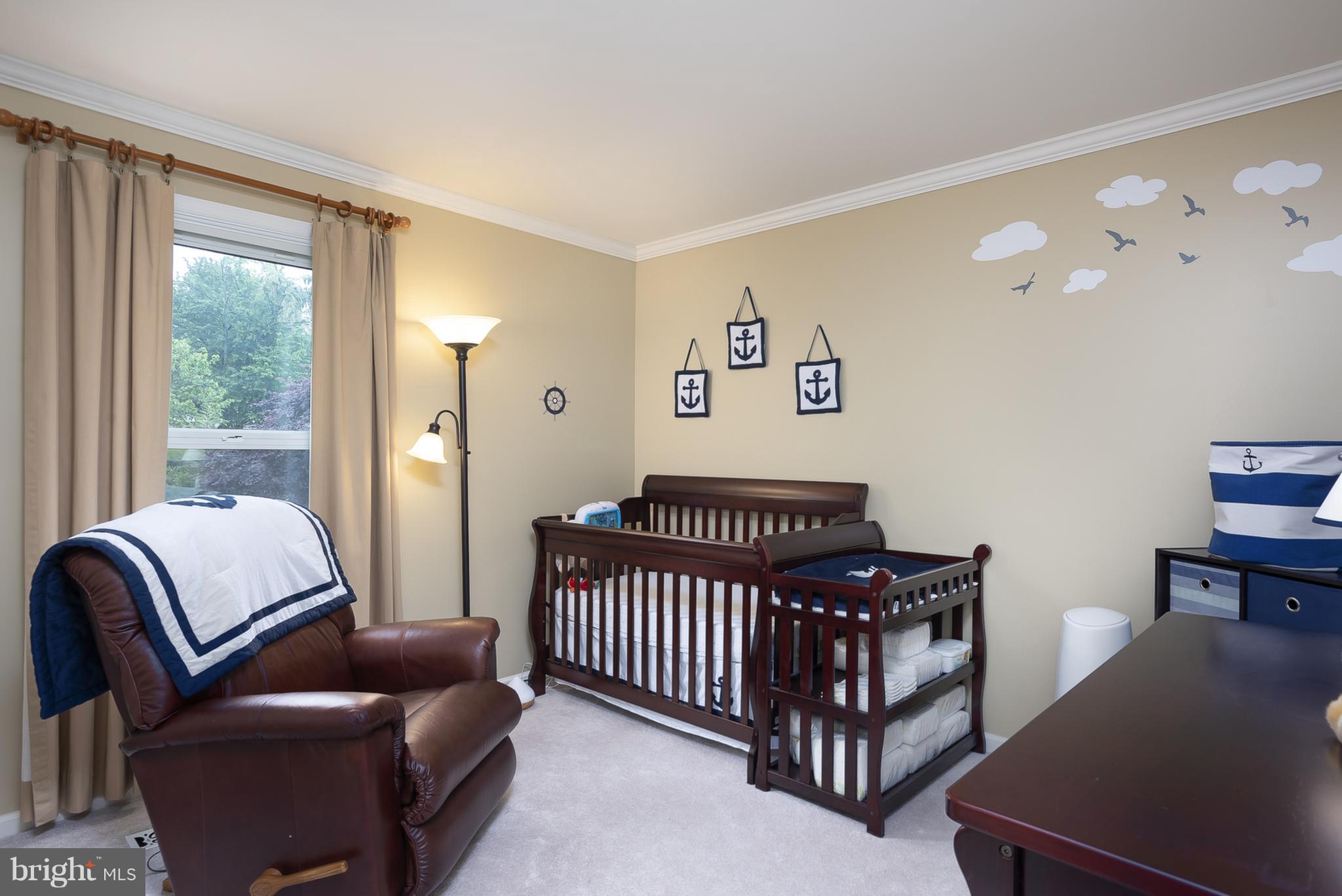 9550 Ridgeview Drive Columbia, MD 21046 - Photo 18 of 30 a bedroom with furniture and a window