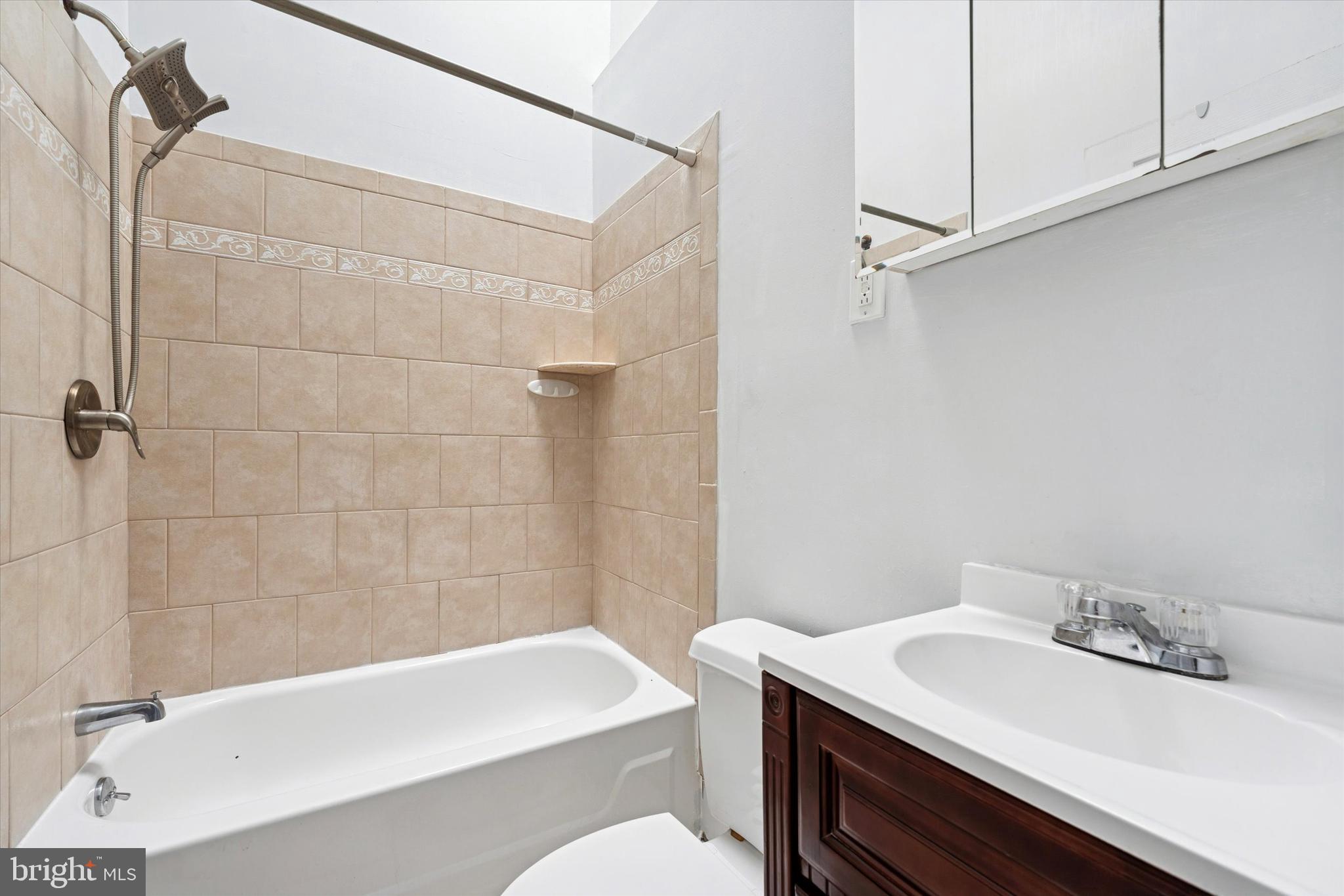 729 South Smedley Street Philadelphia, PA 19146 - Photo 20 of 25 a bathroom with a sink a toilet and shower