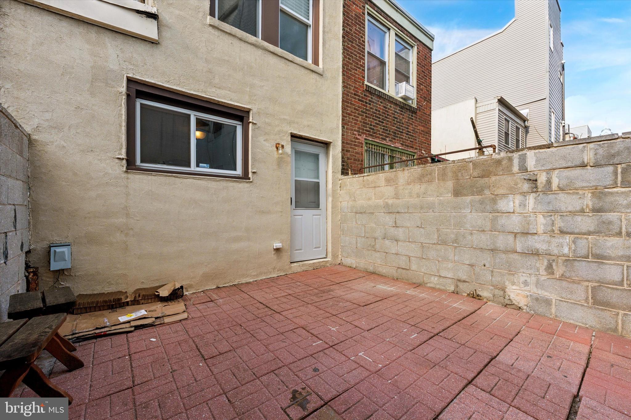 729 South Smedley Street Philadelphia, PA 19146 - Photo 24 of 25 a backyard of a house with barbeque oven