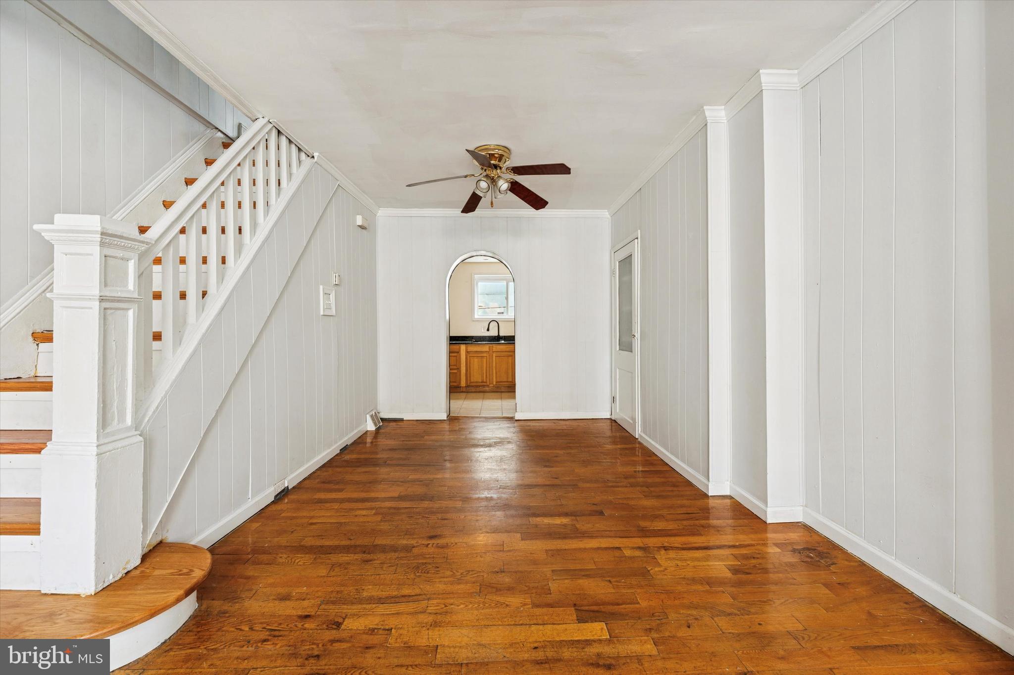 729 South Smedley Street Philadelphia, PA 19146 - Photo 7 of 25 a view of an empty room with a staircase