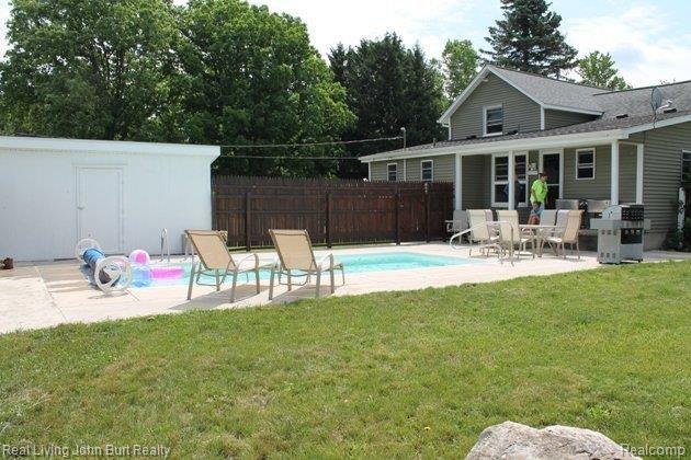1483 Haines Road Lapeer, MI 48446 - Photo 14 of 23 Fenced Pool Area.jpg