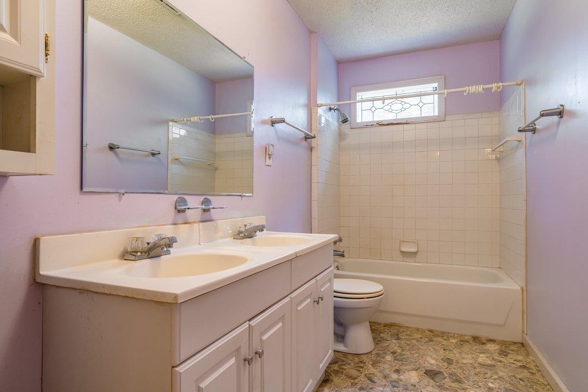6237 Brunswick Road Arlington, TN 38002 - Photo 14 of 25 a bathroom with a sink toilet tub and shower